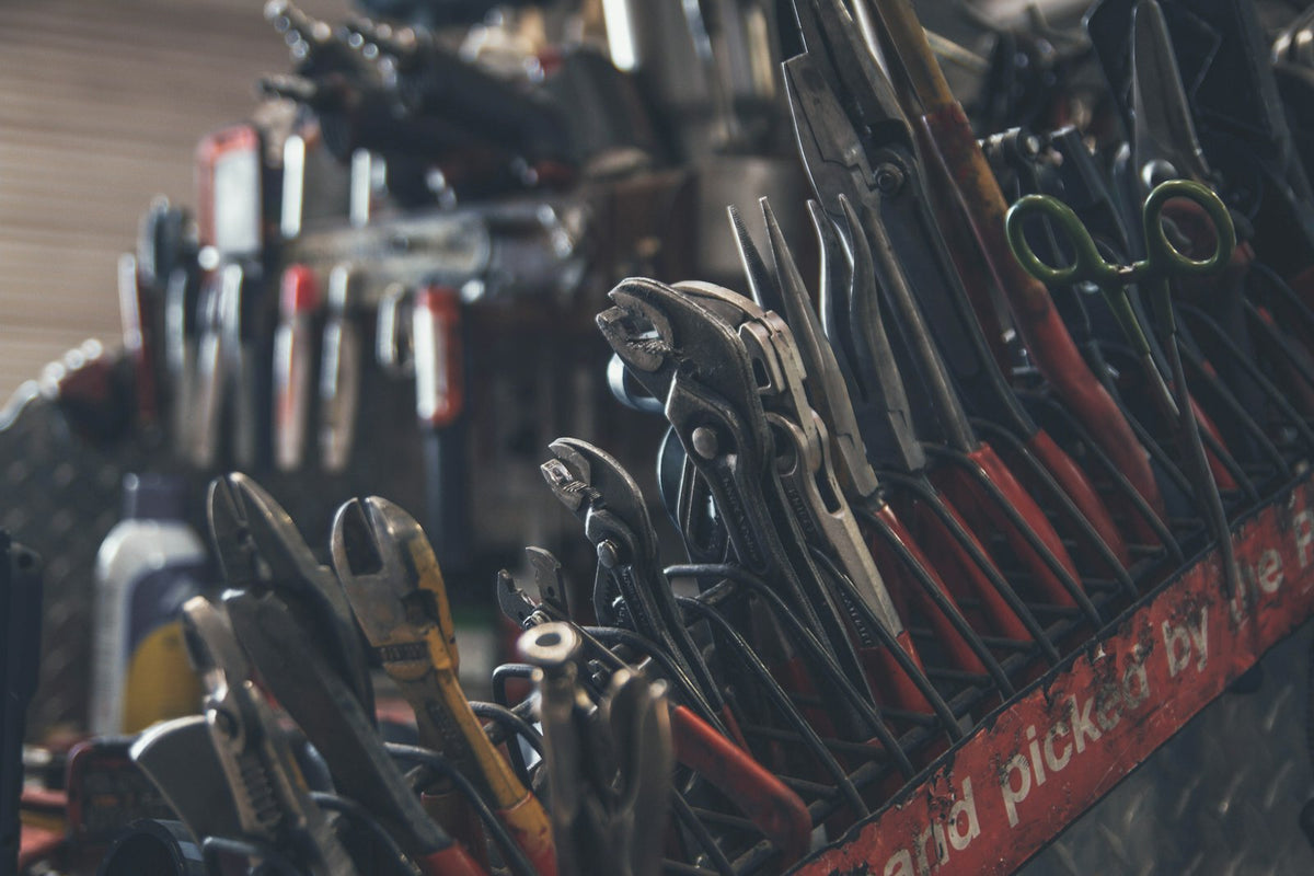 Technician’s tools laid out on a bench