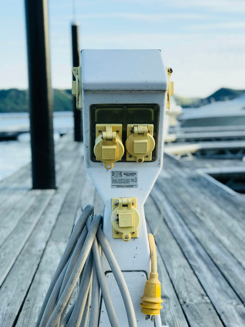 Shore power pedestal on a dock
